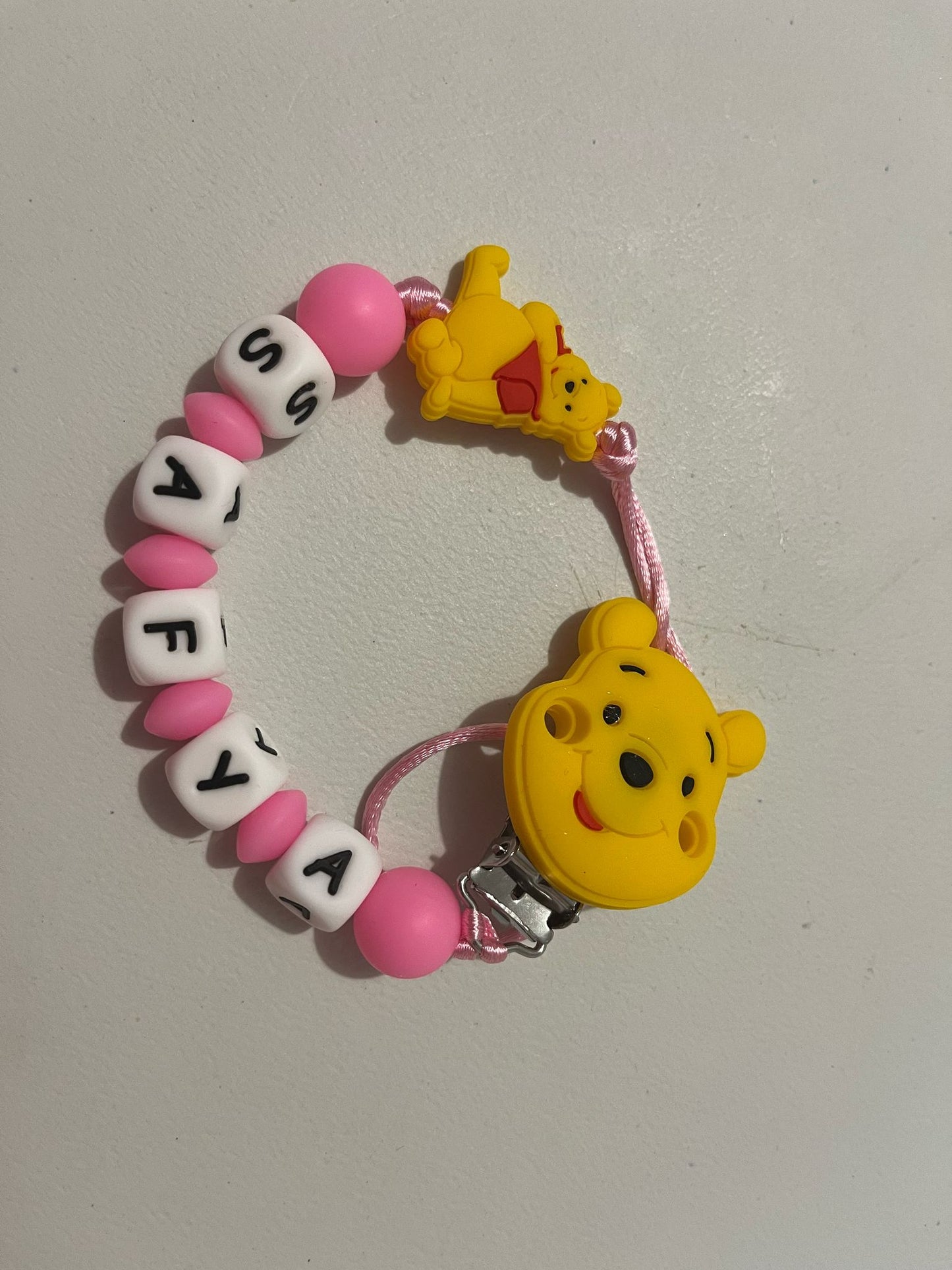 Attache tétine en silicone winnie fille