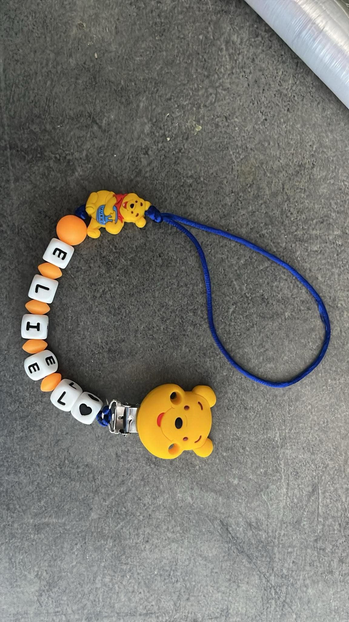 Attache tétine en silicone winnie garçon